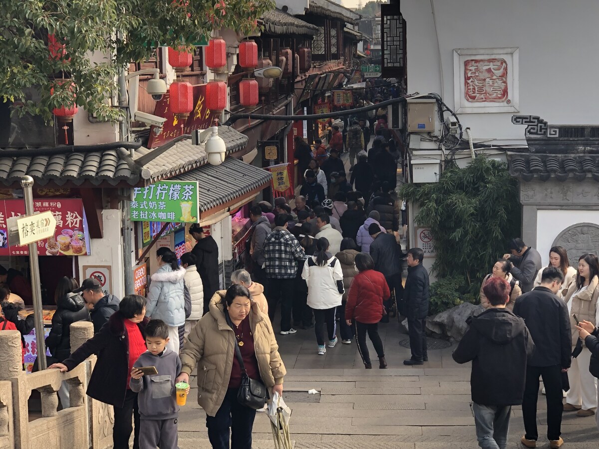 Qi Bao